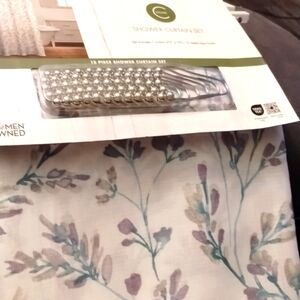 Shower curtain with hooks